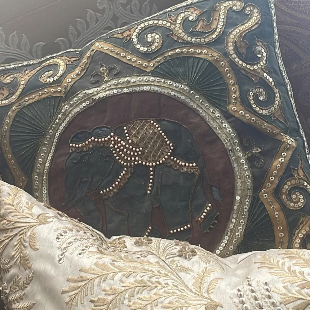 Elephant lovers this pillow is lovely exotic and quite intricate black silk back